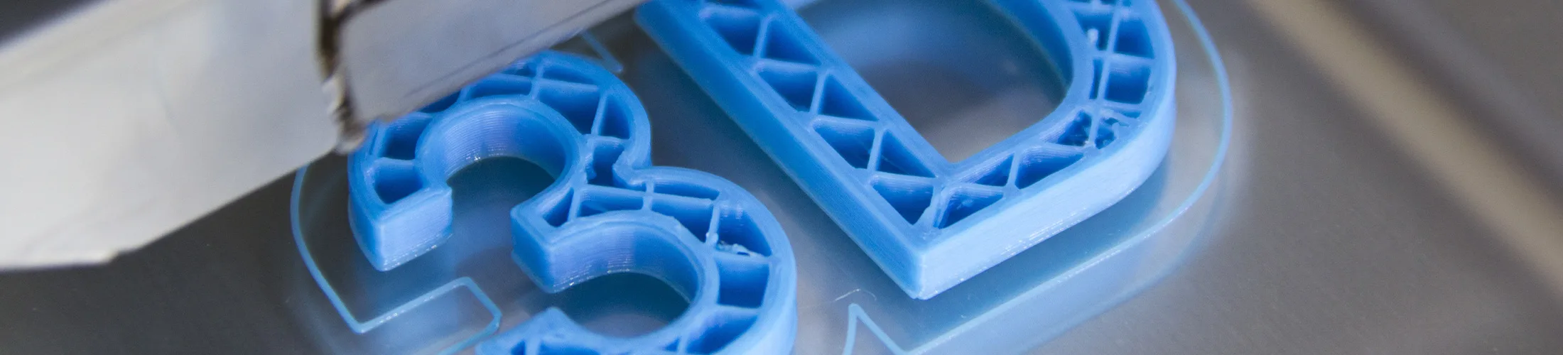 Photo d'un logo 3D imprimé avec une imprimante 3D